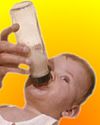 Photo of baby feeding from bottle