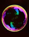 Thumbnail photo of a soap bubble which Nature forms as a simple sphere.