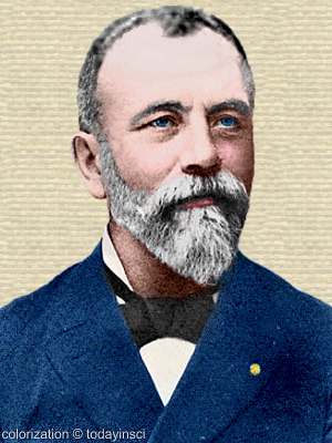 Colorized photo of Marcel Bertrand, head and shoulders, greying beard, facing front. Colorization © todayinsci