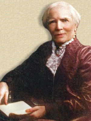 Elizabeth Blackwell, old age, facing front, seated in chair turned to left, book held in lap