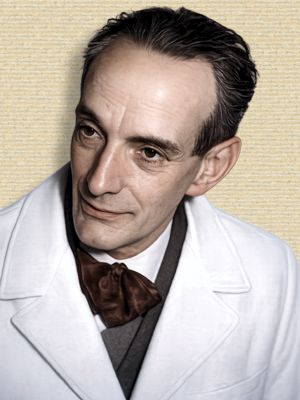 Photo Daniel Bovet, head&shoulders, head tilted, facing left. Original b/w colorized with A.I. ChatGTP (260423).