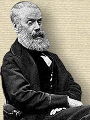 Photo of Henry F. Chorley, full Victorian beard, seated, upper body, facing right