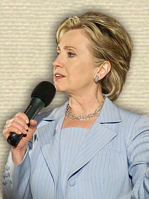 Photo of Hillary Clinton holding microphone at a Presidential Primary