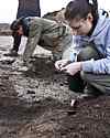 Thumbnail archaeologist digging for Roman artifacts, Wiesbaden Army Airfield in Germany. Credit US Army Corps of Engineers.