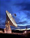 Thumbnail photo of radio telescope dish with twilight sky background