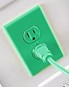 Thumbnail photo of green coloured plug, cord and socket