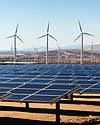 Thumbnail photo of renewable energy sources showing solar panels among wind turbines