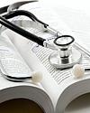 Thumbnail photo of stethoscope resting on open book
