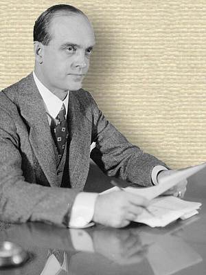 Photo of Frank Glenn seated at his desk - upper body - University of Wisconsin Archives