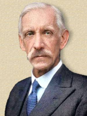 Photo of Sir Frederick Gowland Hopkins, upper body, facing front, b/w colorized with help of palette.fm