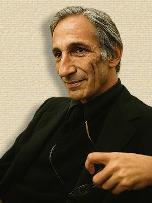 Photo Ivan Illich head&shoulders facing half-right. Orig. b/w colorized with sora A.I. 