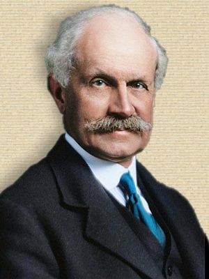 Photo of Sir John Graham Kerr, head and shoulders, facing front. Colorization from original b/w, helped by palette.fm
