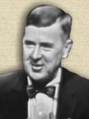 Video still of Ralph Lapp, head and shoulders, with bow tie and suit, facing front