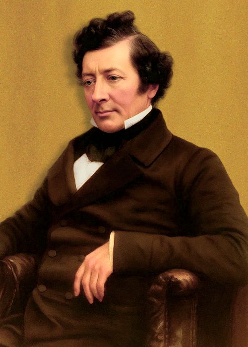 Photo John Pringle Nichol, seated, upper body, facing half left. Orig b/w colorized by sora A.I. (250919)