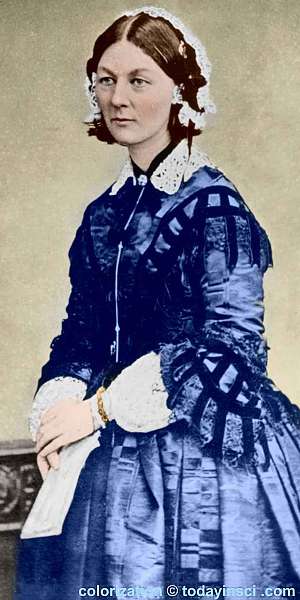 Florence Nightingale, standing, facing left. Colorization © todayinsci.com