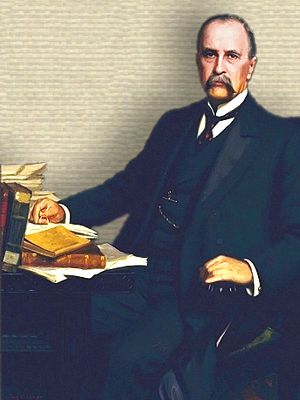 Portrait of William Osler seated at desk - full body