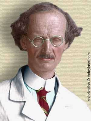 Photo of Auguste Piccard 1932 - head and shoulders in lab coat - colorization © todayinsci.com