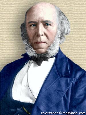 Herbert Spencer photo, face forward & shoulders, white hair, balding forehead, mutton chops beard. Colorization © todayinsci.com