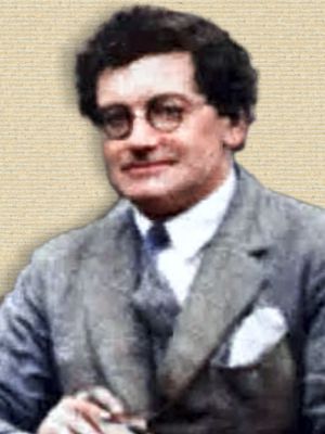 Photo of John W.N. Sullivan, upper body, face forward. Original b/w colorized with help of palette.fm