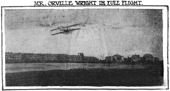 Photo of Orville Wright's biplane in full flight, b/w